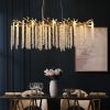 39.4-inch Modern Golden Pendant Light with Cascading Crystal Strands, Ideal for Living Room, Dining Room and Foyer